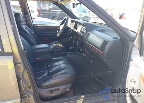 1997 Jeep Grand Cherokee Limited z USA, uszkodzony, nr VIN 1J4GZ78Y5VC613495